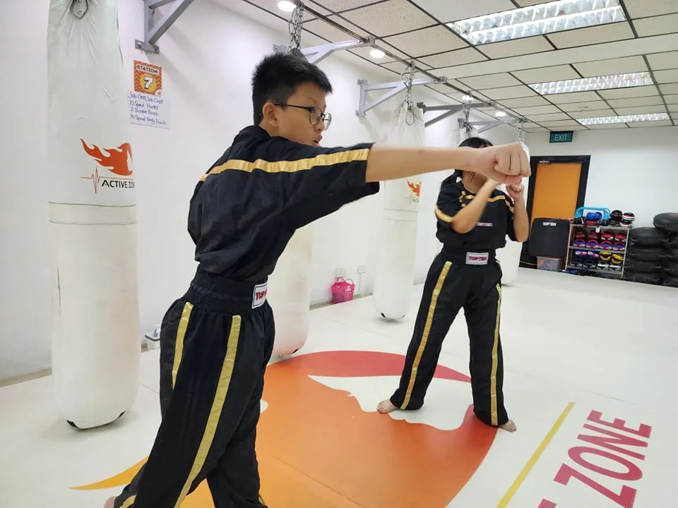 active-zone-kids-kickboxing-singapore-grading-martial-arts-self-defense-singapore
